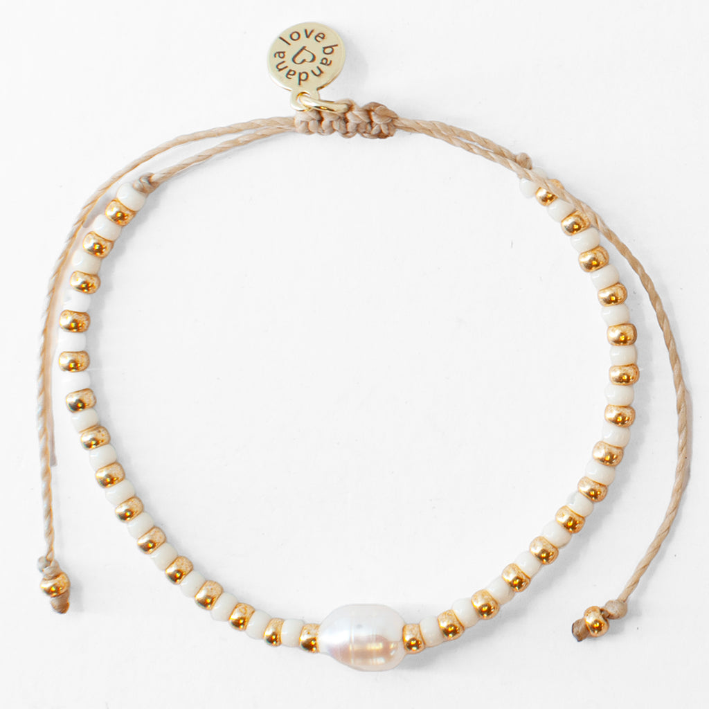 Pearl in Ivory and Gold Beaded String