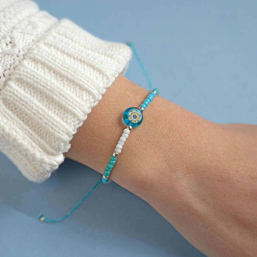 Millefiori Flower in Turquoise and White Beaded String